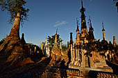 Inle Lake Myanmar. Indein, on the summit of a hill the  Shwe Inn Thein Paya a cluster of hundreds of ancient stupas. Many of them are ruined and overgrown with bushes. 